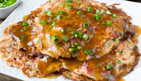 Order Roast Pork Egg Foo Young food online from China Wok store, Cypress on bringmethat.com