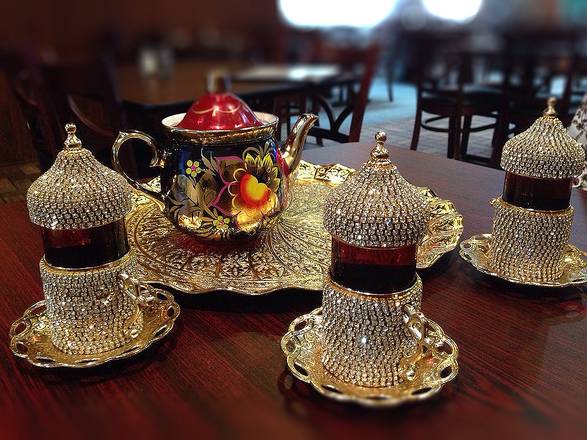 Order Cardamom Tea food online from Arabian Nights Cafe store, Colorado Springs on bringmethat.com
