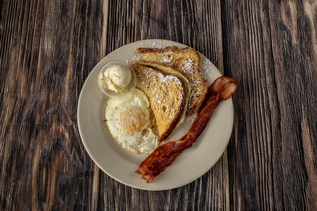 Order French Toast with 1 Egg and 2 Bacon Strips food online from House of Pies store, Los Angeles on bringmethat.com