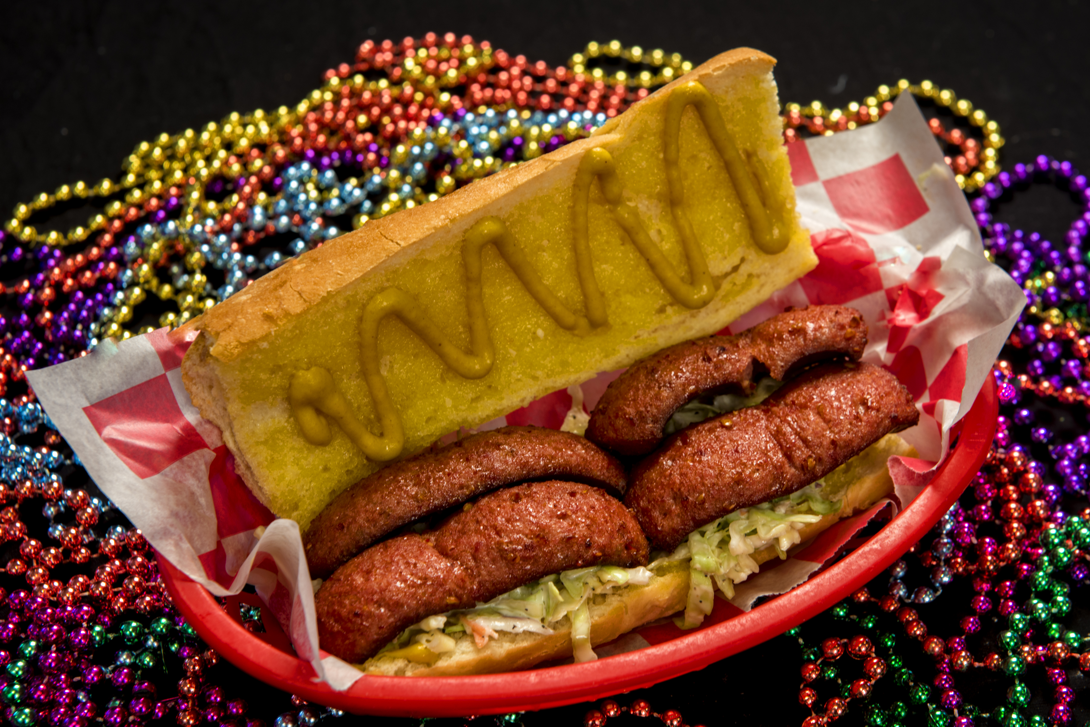 Order Spicy Cajun Sausage Po Boy with Coleslaw and Mustard food online from The Lost Cajun store, Greenville on bringmethat.com