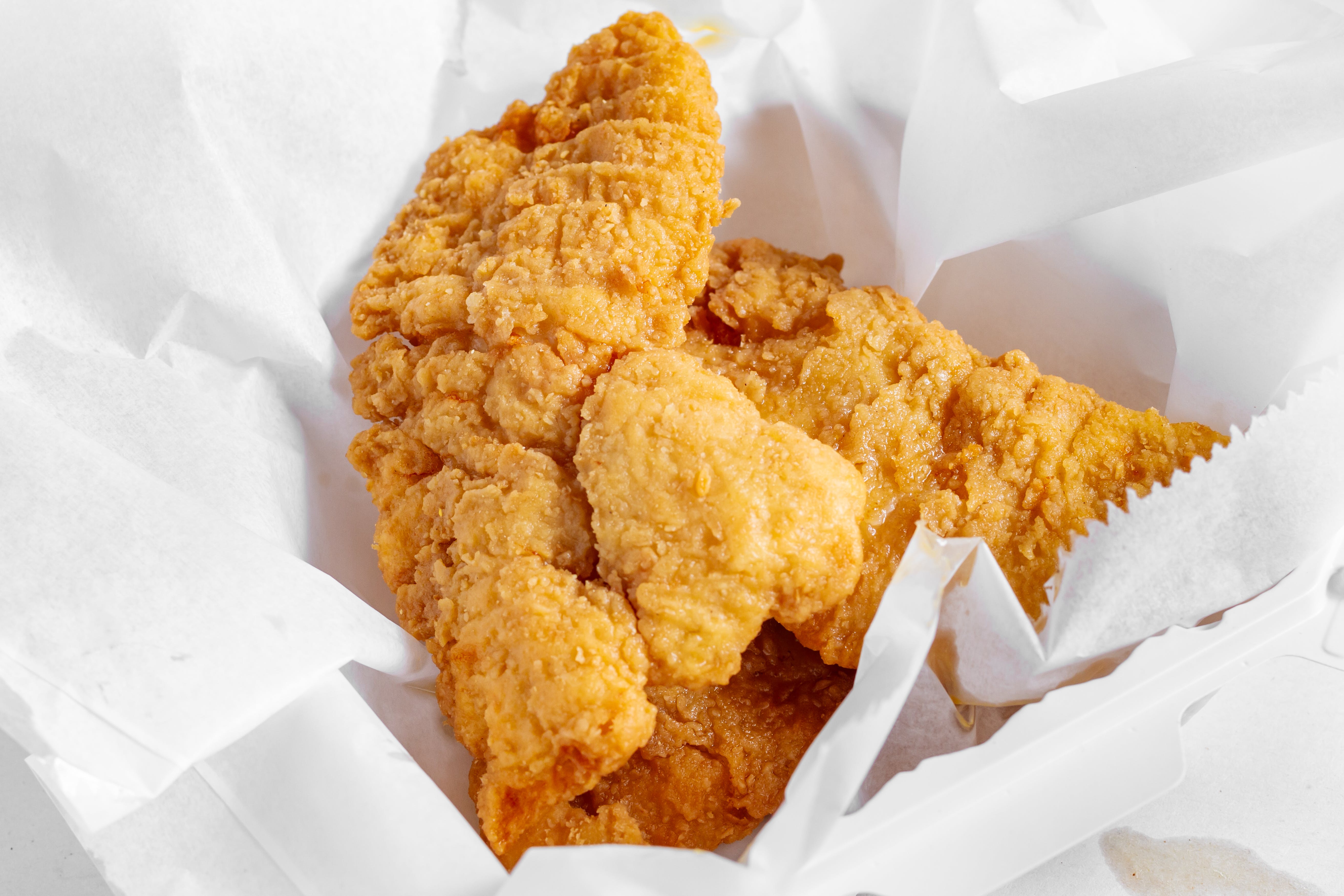 Order Chicken Fingers - 3 Pieces food online from Wings Things N More store, Catonsville on bringmethat.com
