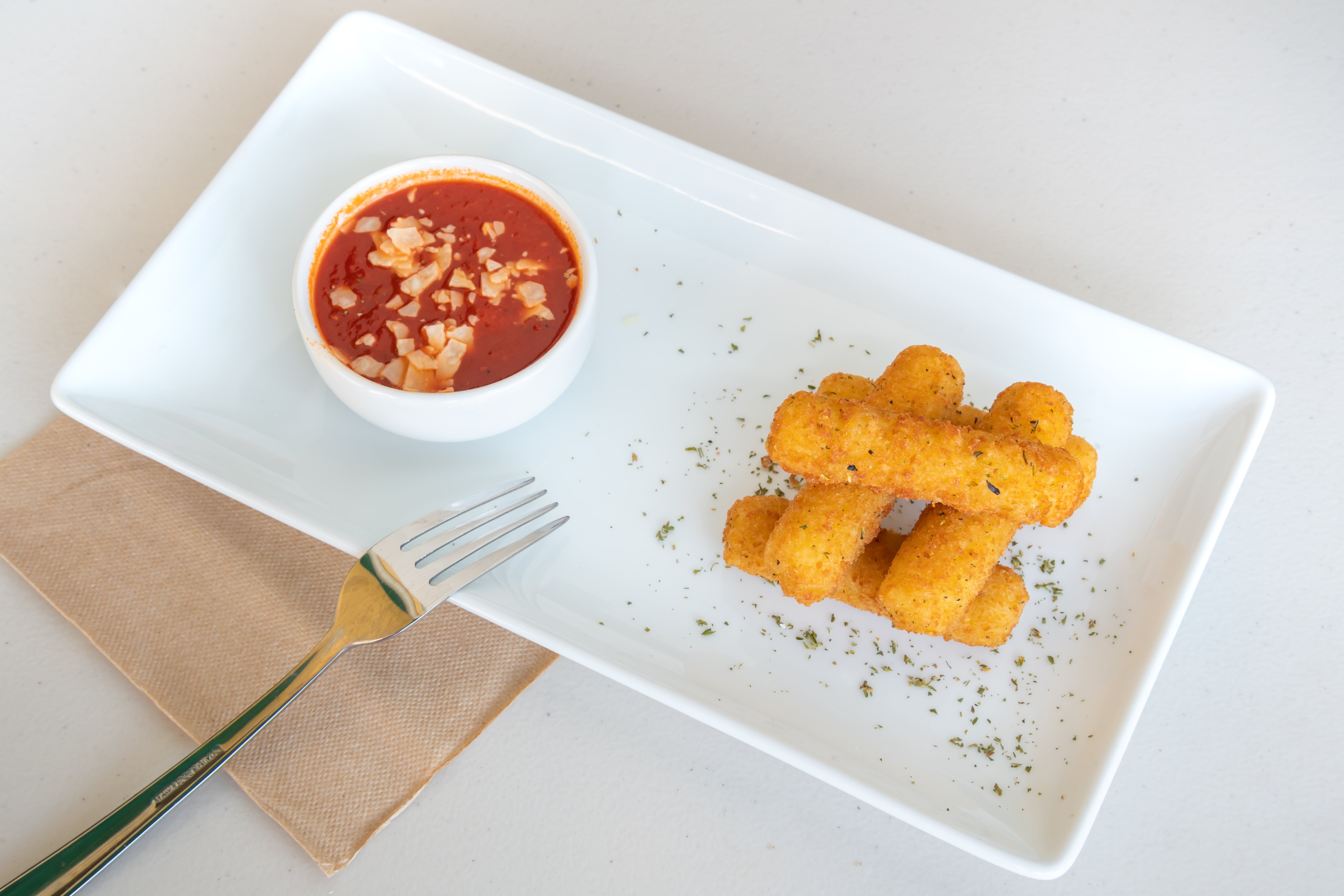 Order Fried Mozzarella Sticks - Appetizer food online from Pizza Machine - Hollywood store, Hollywood on bringmethat.com