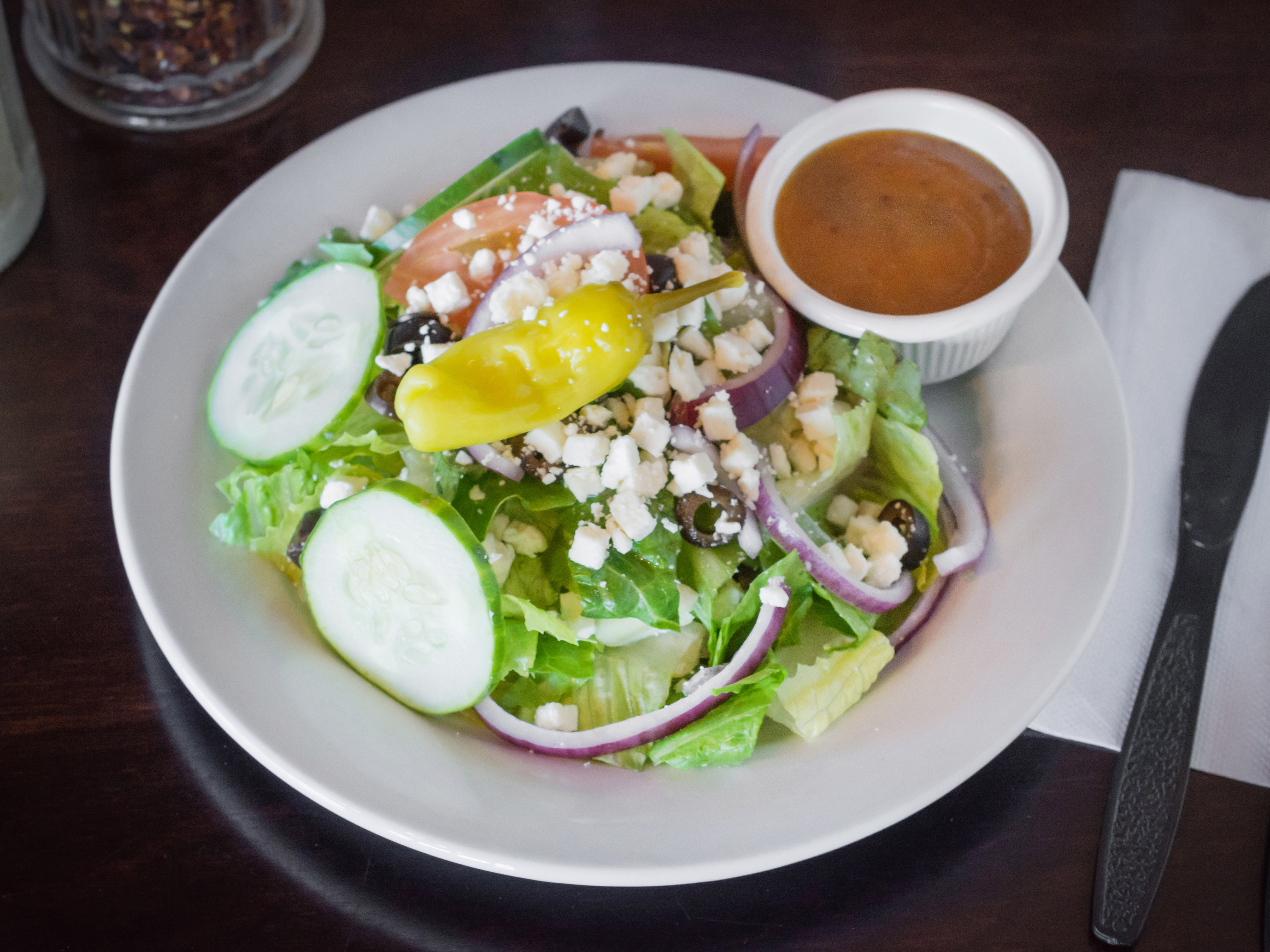 Order Greek Salad food online from Two Guys Pizza store, Henrico on bringmethat.com