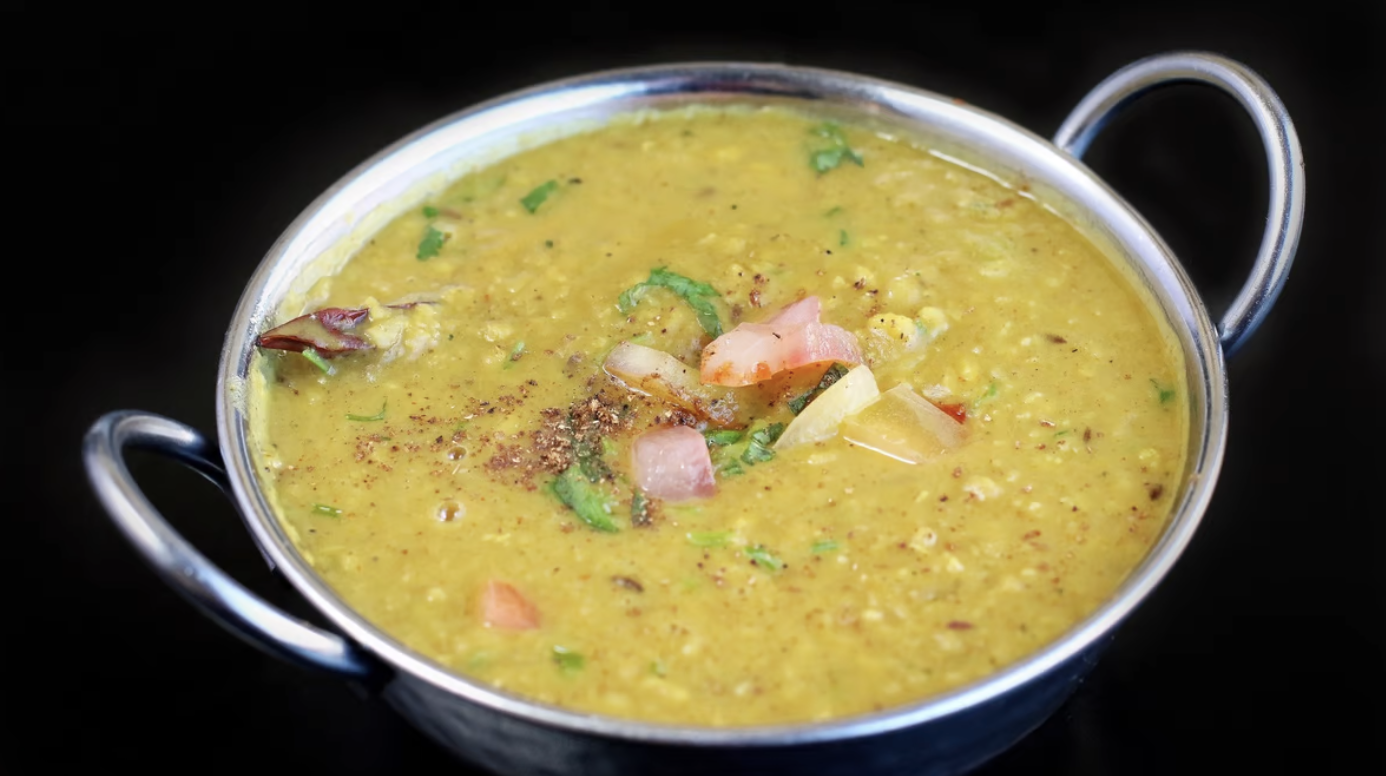Order Yellow Dal (Lentils) food online from A Desi Cafe  store, San Francisco on bringmethat.com