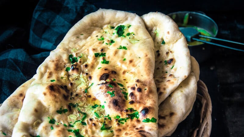 Order Garlic Naan food online from India Palace store, Salem on bringmethat.com