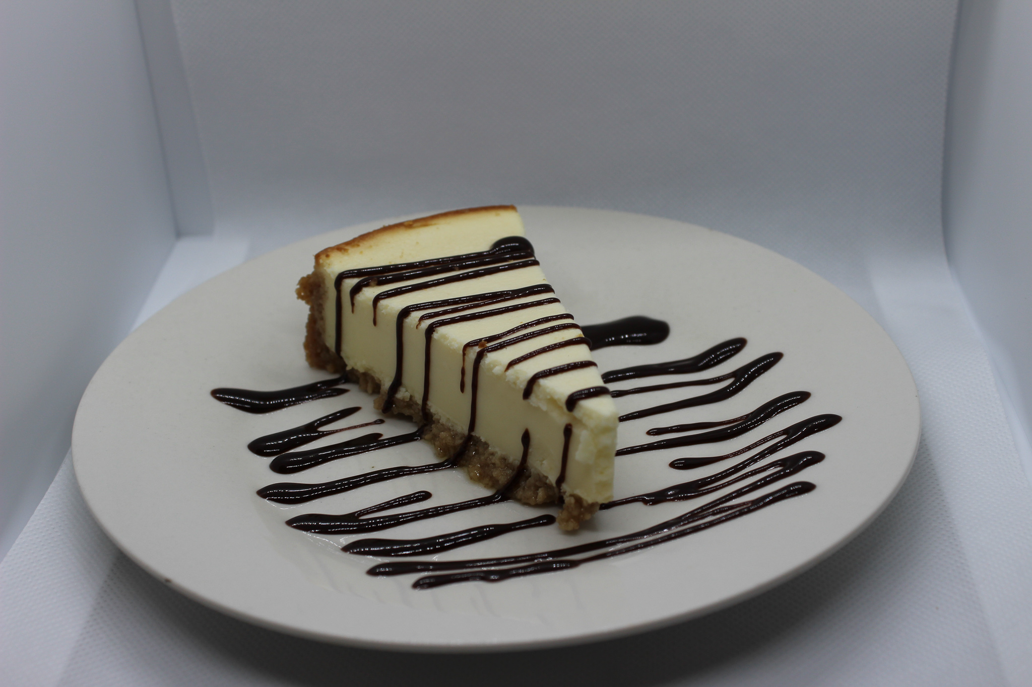 Order Plain Cheesecake food online from Two Mamas' Gourmet Pizzeria store, Prescott on bringmethat.com