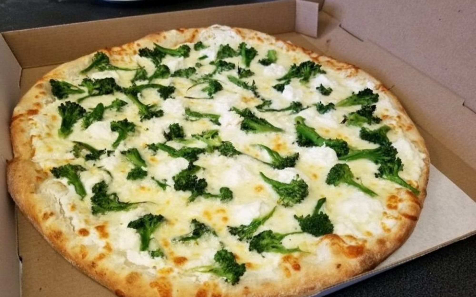 Order White Pizza with Broccoli  food online from Donna Pizza store, Palisades Park on bringmethat.com