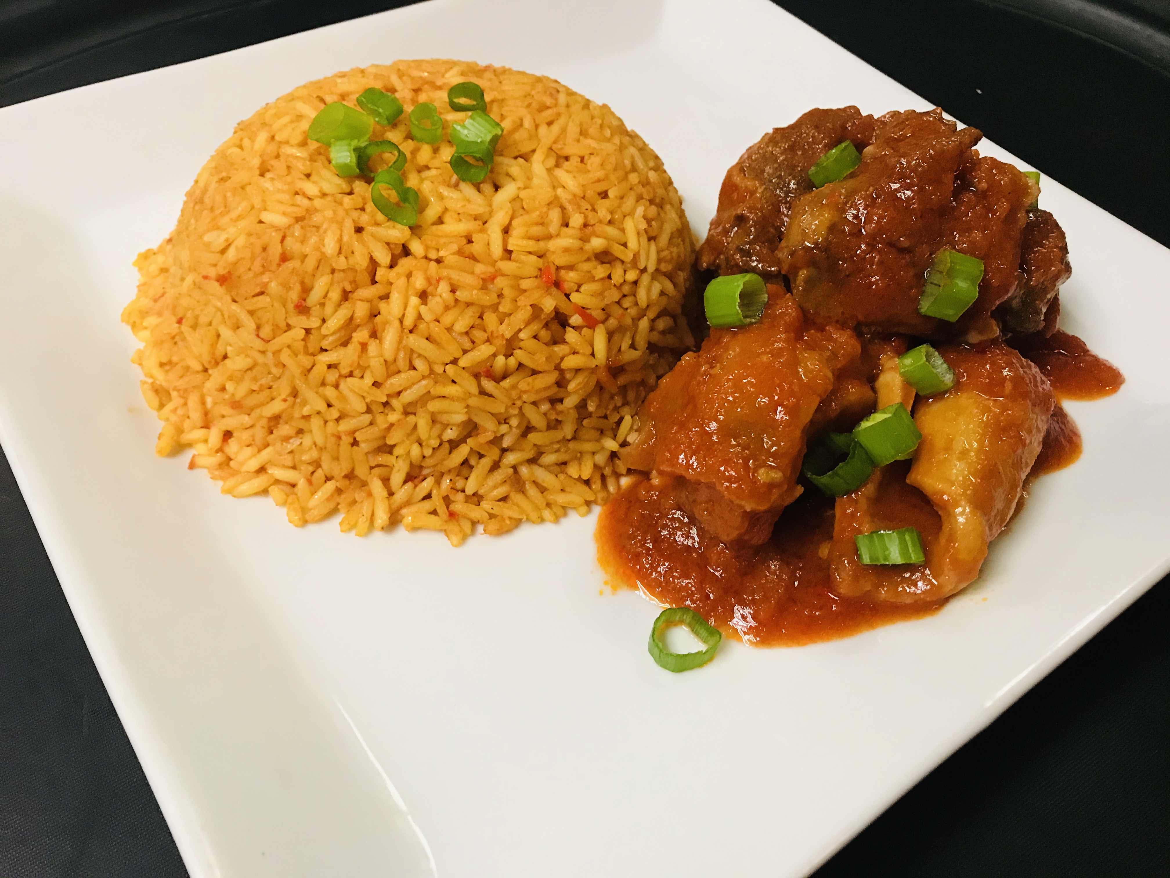 Order Jollof Rice food online from Vee Vee African Restaurant store, Chicago on bringmethat.com