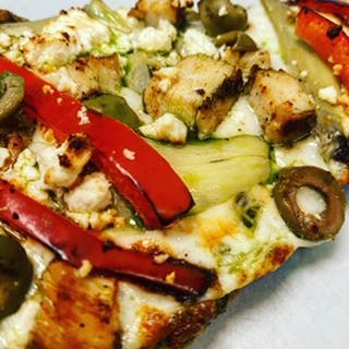Order Pesto Greek Pizza - Big Slice food online from GoodFellas Pizzeria store, San Francisco on bringmethat.com