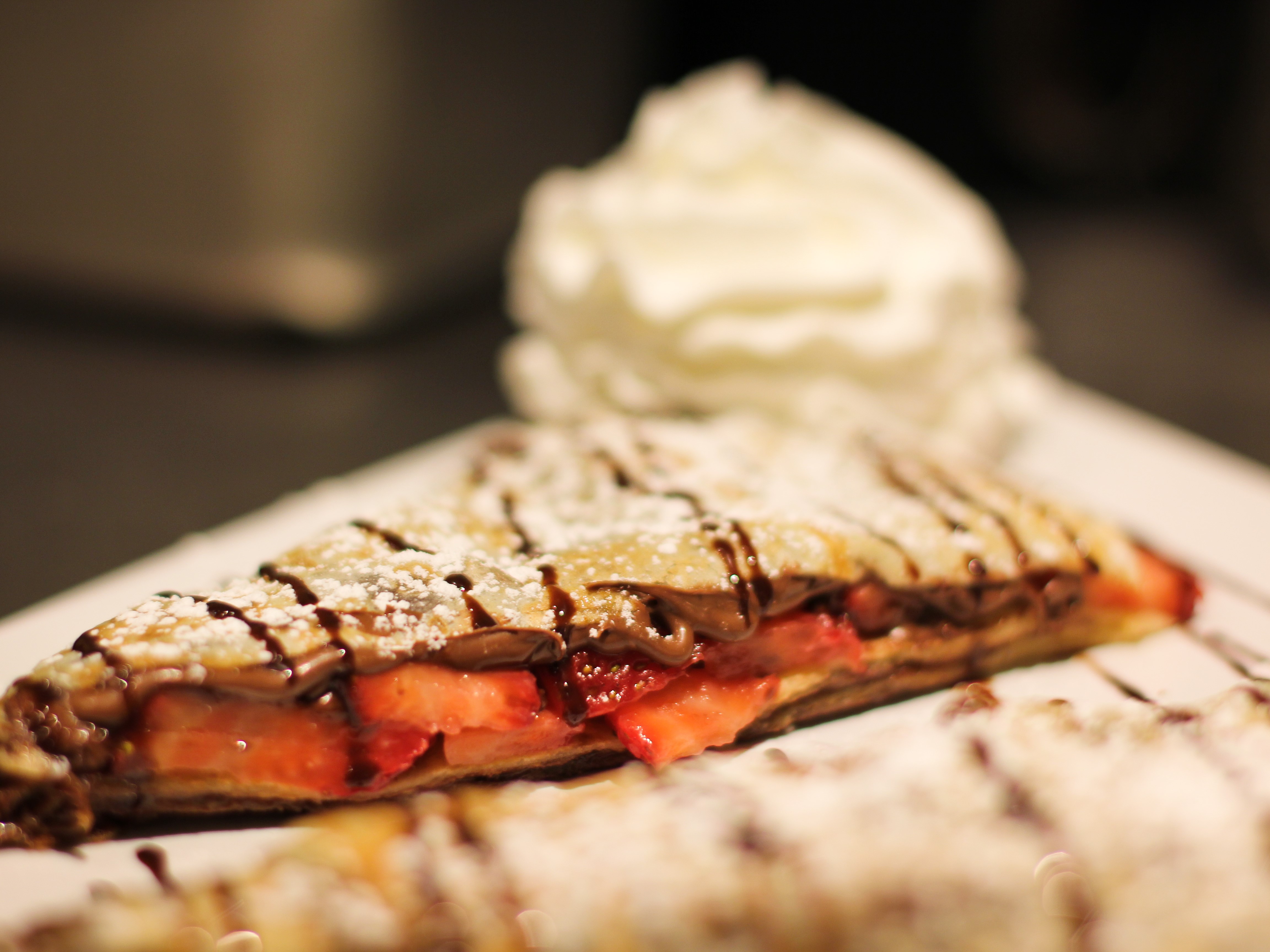 Order Nutella Strawberry Crepe food online from Long Island Coffee Company store, Selden on bringmethat.com