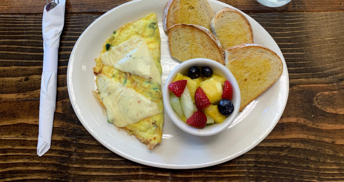 Order The Spicy Garden Omelette food online from The Farmhouse Breakfast & Lunch store, Lubbock on bringmethat.com
