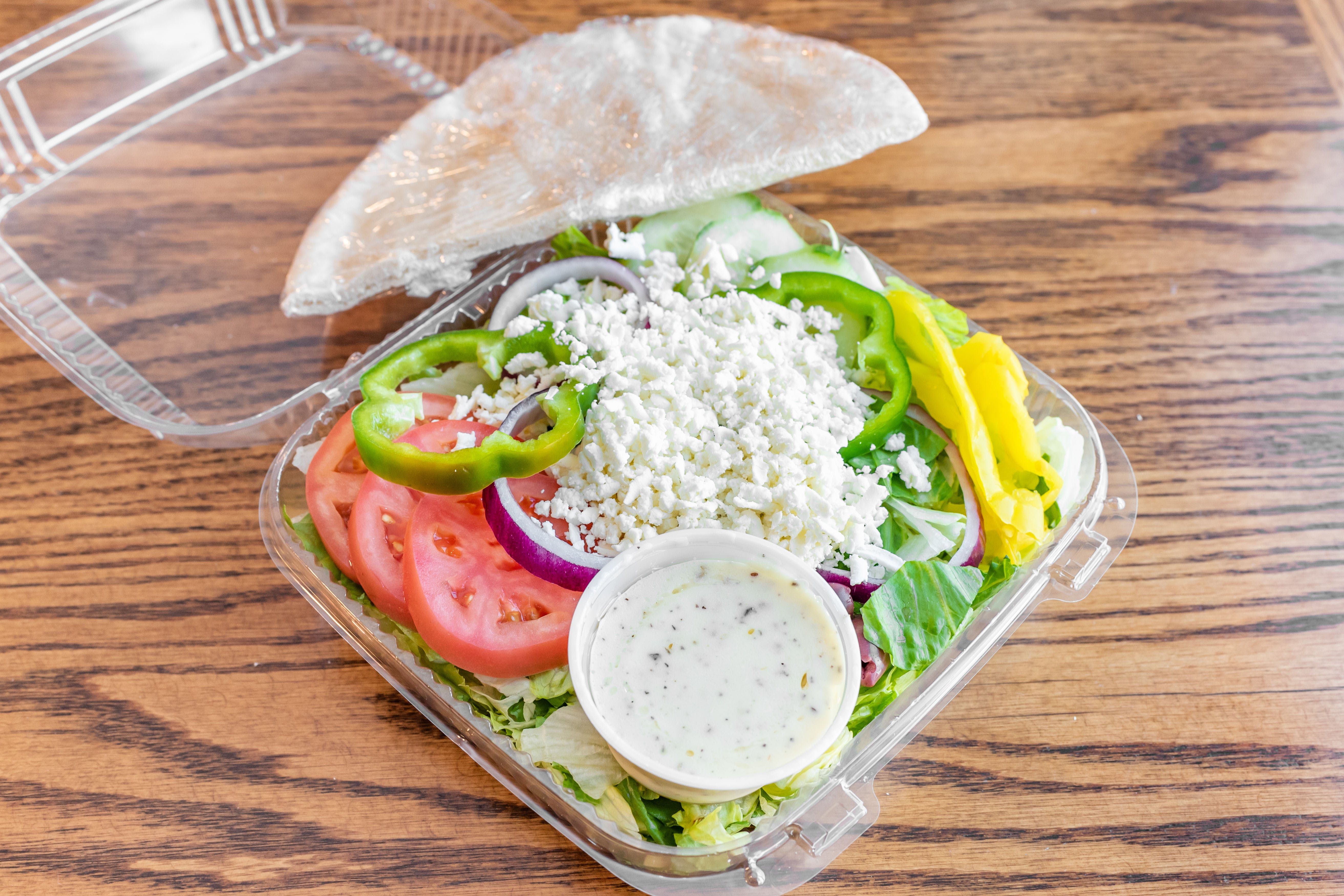 Order Greek Salad - Salad food online from Bryantville Pizza Kitchen store, Pembroke on bringmethat.com