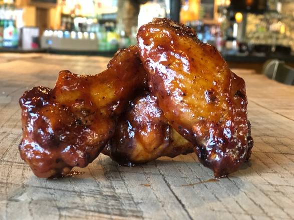 Order Smoked Chicken Wings - Honey Chipotle food online from Holy Cow store, Alexandria on bringmethat.com