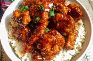Order General Tso's Chicken or Shrimp (w. Classic Fried Rice and Egg Roll) 左宗鸡或虾 food online from Fine China store, Lansing on bringmethat.com