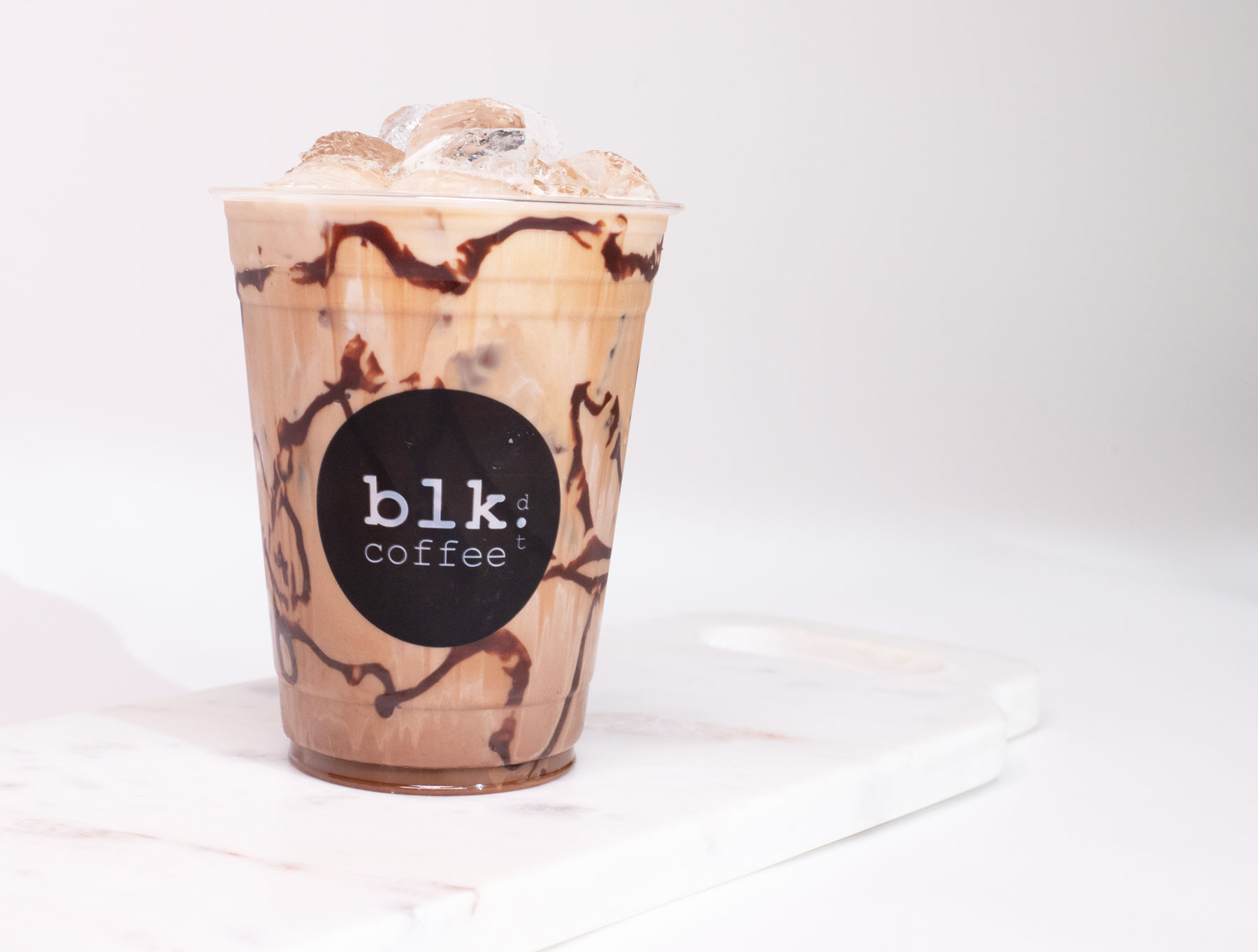 Order Iced Mocha Coffee food online from Blk Dot Coffee store, Irvine on bringmethat.com