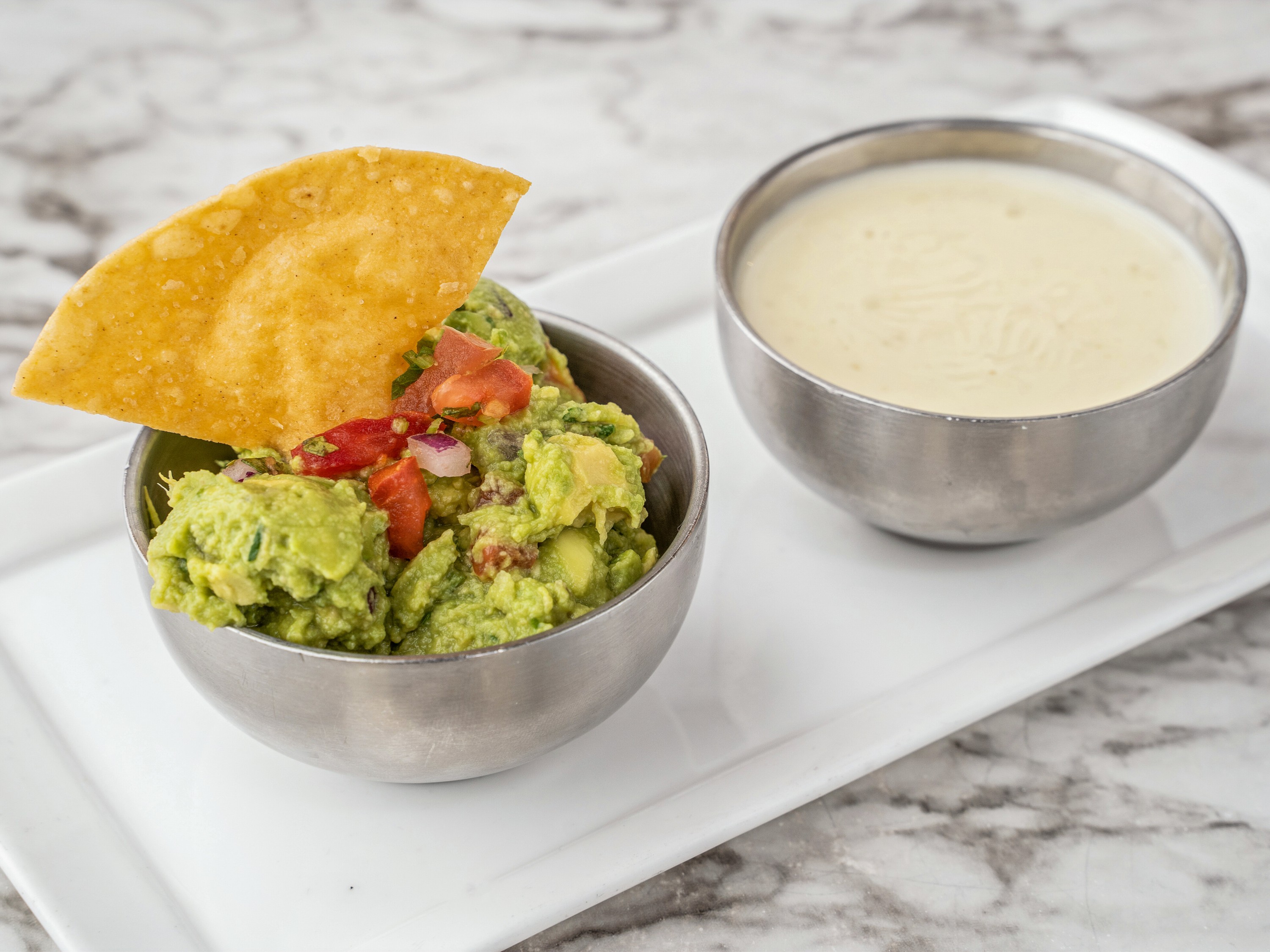 Order Queso and Guacamole food online from Zocalo Street Food | Tequila store, Wilmington on bringmethat.com