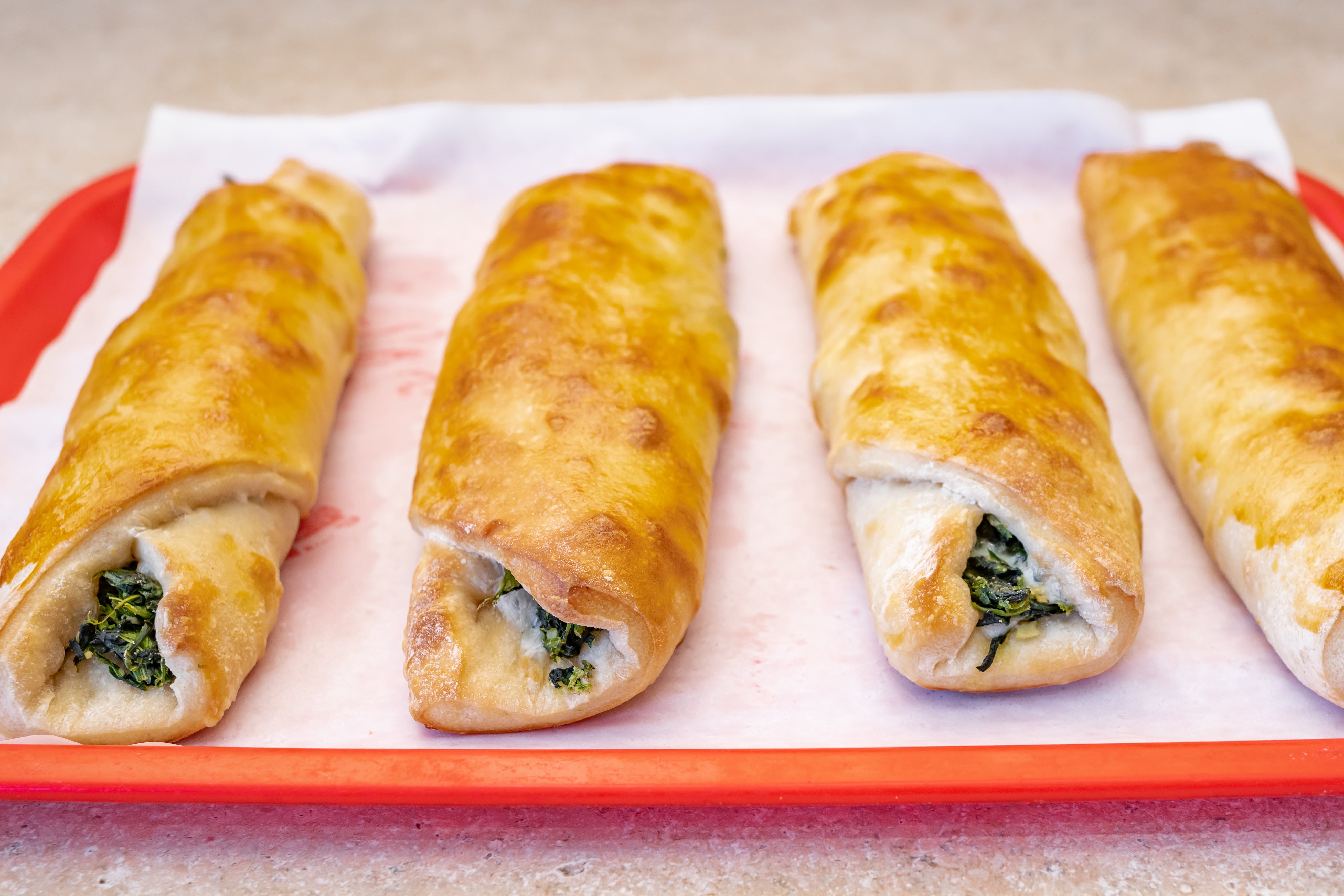 Order Spinach & Cheese Roll - Roll food online from Bella Pizza store, Springfield Gardens on bringmethat.com