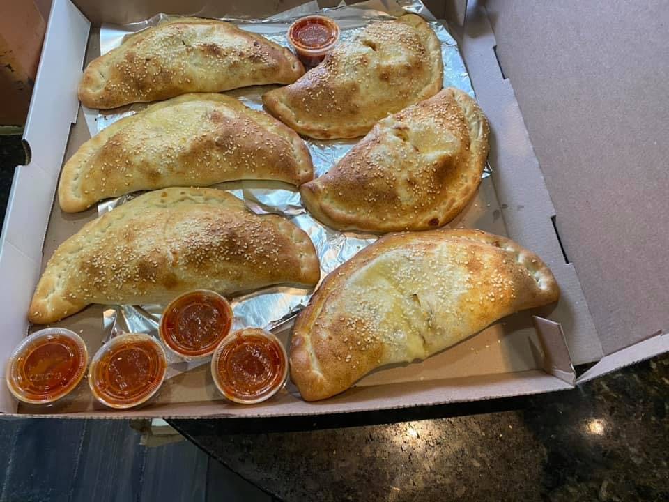Order Cheese Calzone - Italian Stromboli & Calzones food online from Pizza stop store, New York on bringmethat.com