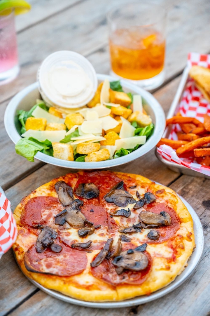 Order Pizza + Salad food online from Backyard On Broadway store, San Antonio on bringmethat.com