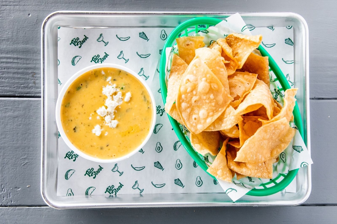 Order Chips n' Queso food online from The Taco Stand store, Houston on bringmethat.com