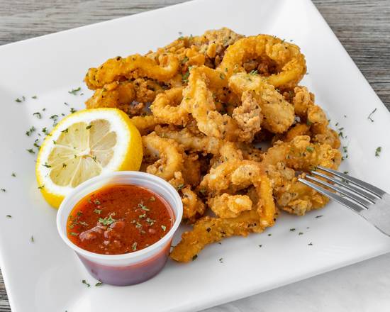 Order Fried Calamari food online from Cyber Pizza Cafe store, Dania Beach on bringmethat.com