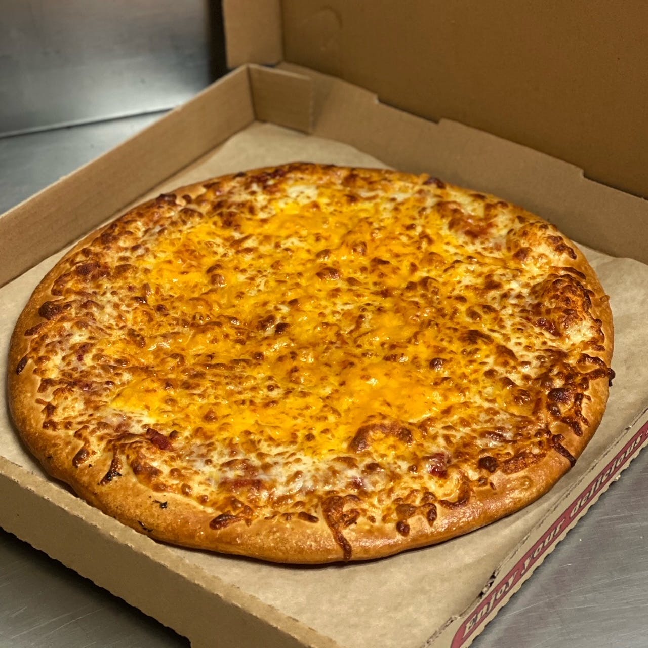 Order Four Cheeses Pizza - Small 10" food online from Jojo's Pizzeria store, Sacramento on bringmethat.com