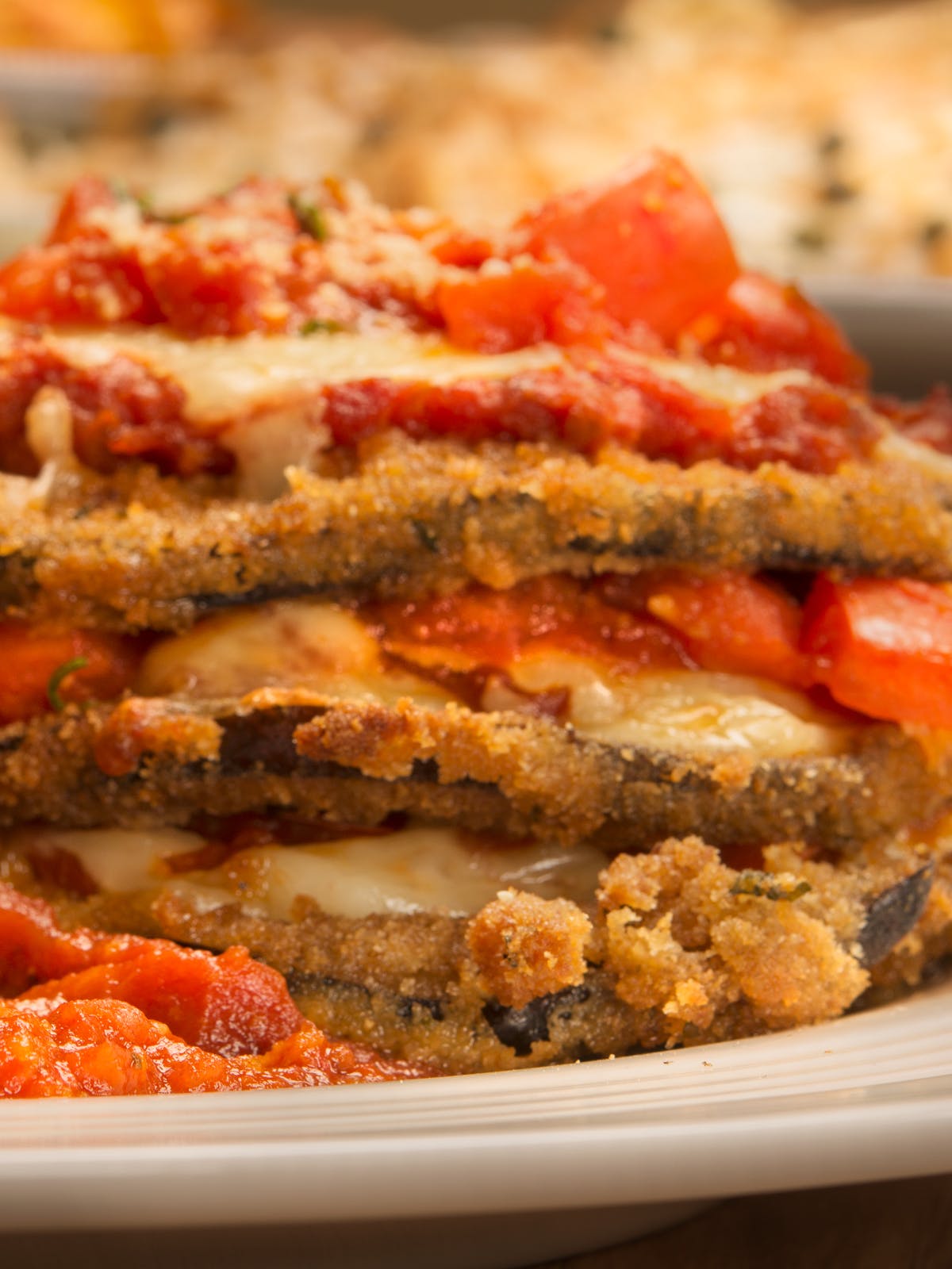 Order Eggplant Parmigiana - Small (Serves 3 People) food online from Buca di Beppo store, Austin on bringmethat.com