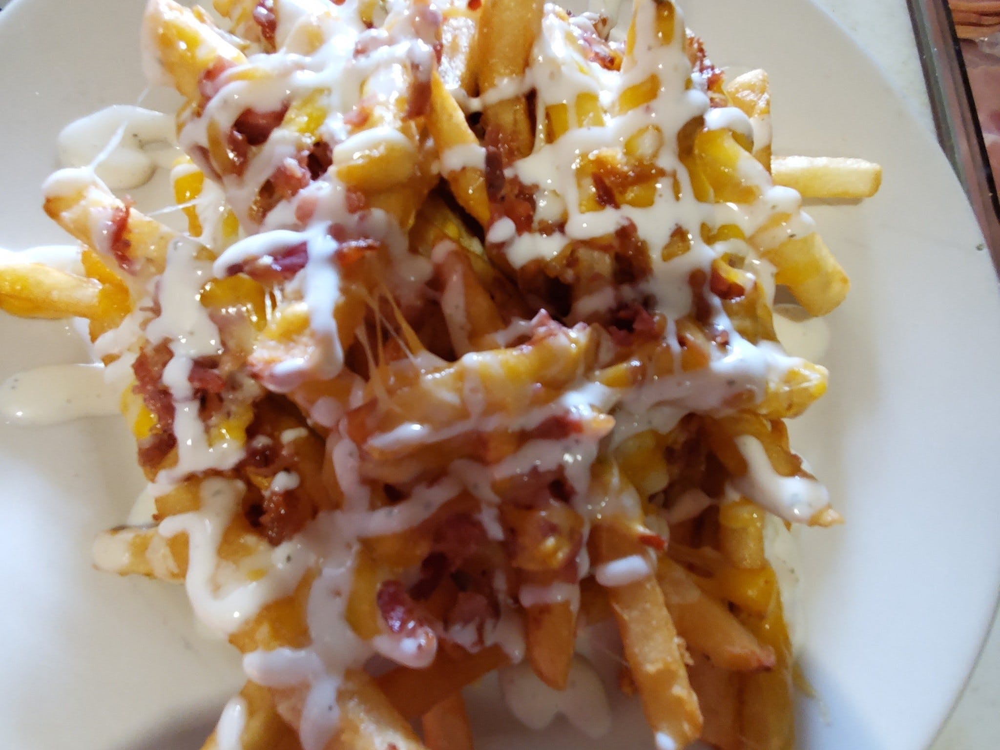 Order Loaded French Fries - Appetizer food online from Yordana Pizza Ii store, Fairless Hills on bringmethat.com