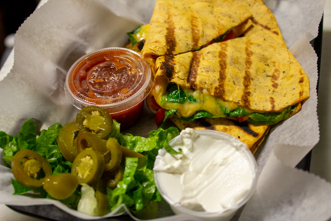 Order Veggie Quesadilla food online from Toons Bar & Grill store, Chicago on bringmethat.com