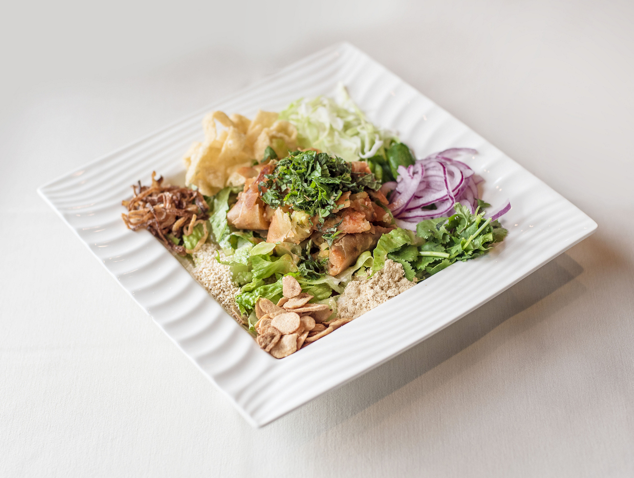 Order Samusas Salad food online from Experience Burma Restaurant & Bar store, Pleasanton on bringmethat.com