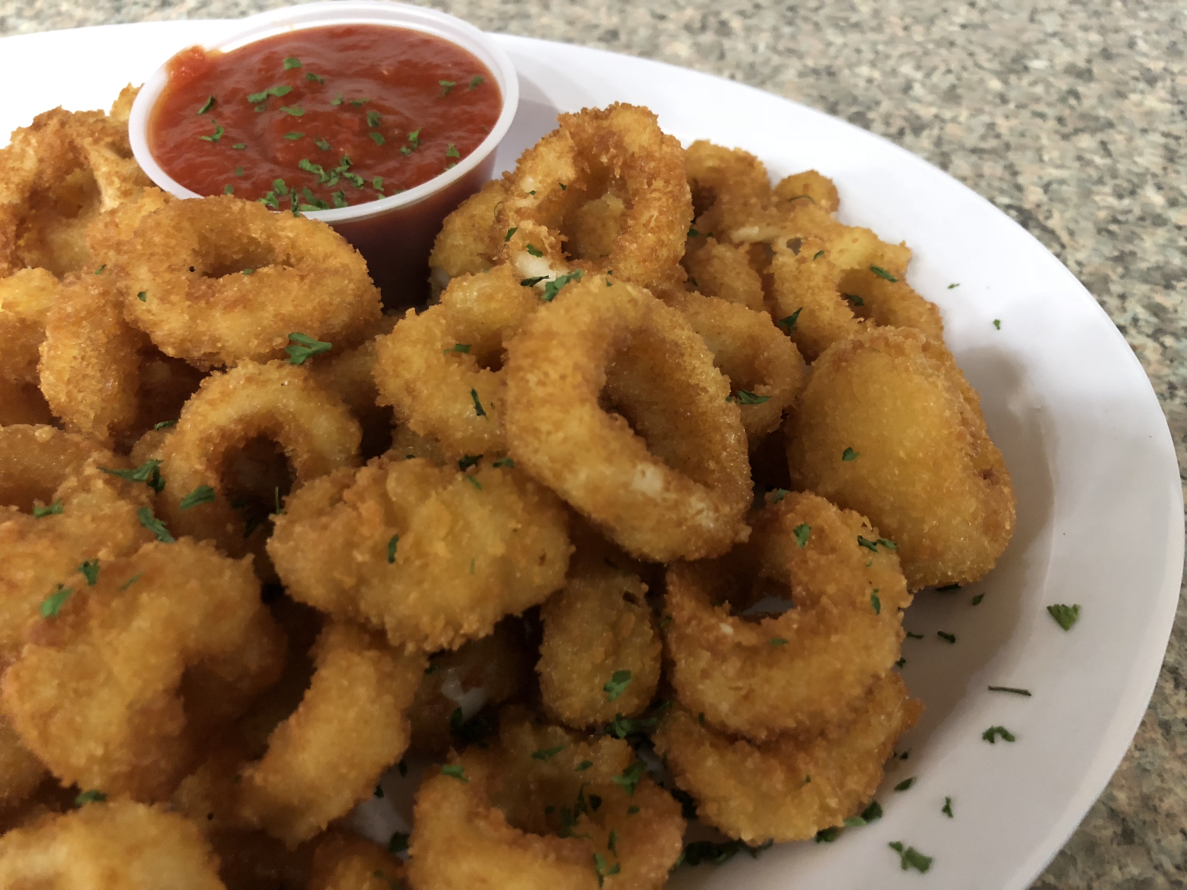 Order Fried Calamari food online from Andalus Pizza & Cafe store, Brighton on bringmethat.com