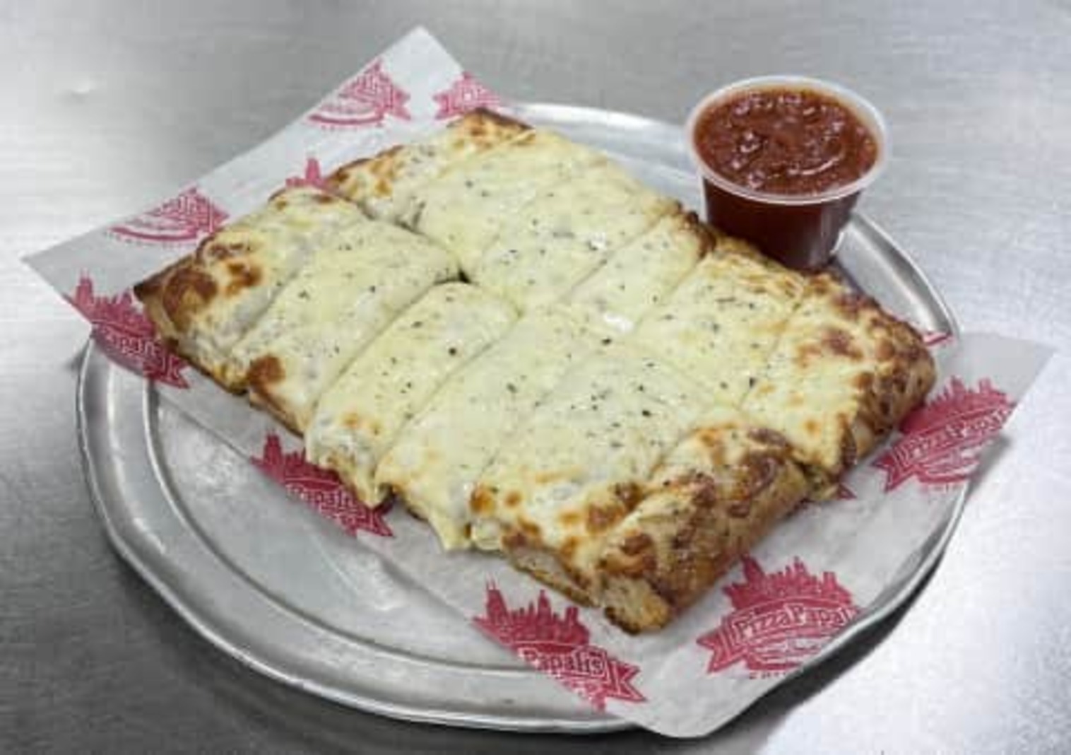 Order Garlic Bread with Cheese food online from PizzaPapalis store, Bloomfield Hills on bringmethat.com