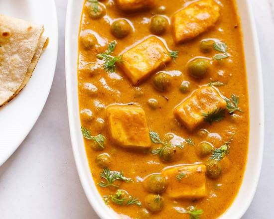Order Muttar Paneer food online from Taste Of India store, Albuquerque on bringmethat.com