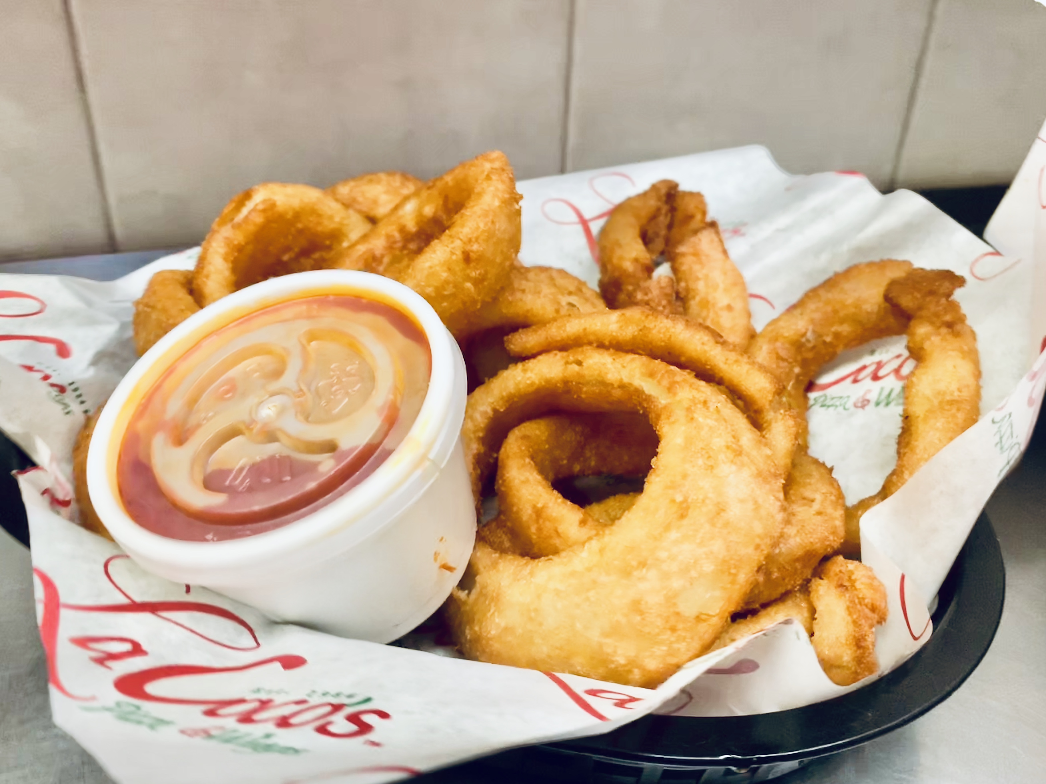 Order Onion Rings food online from LaCoco's Pizza & Pasta store, Chicago on bringmethat.com
