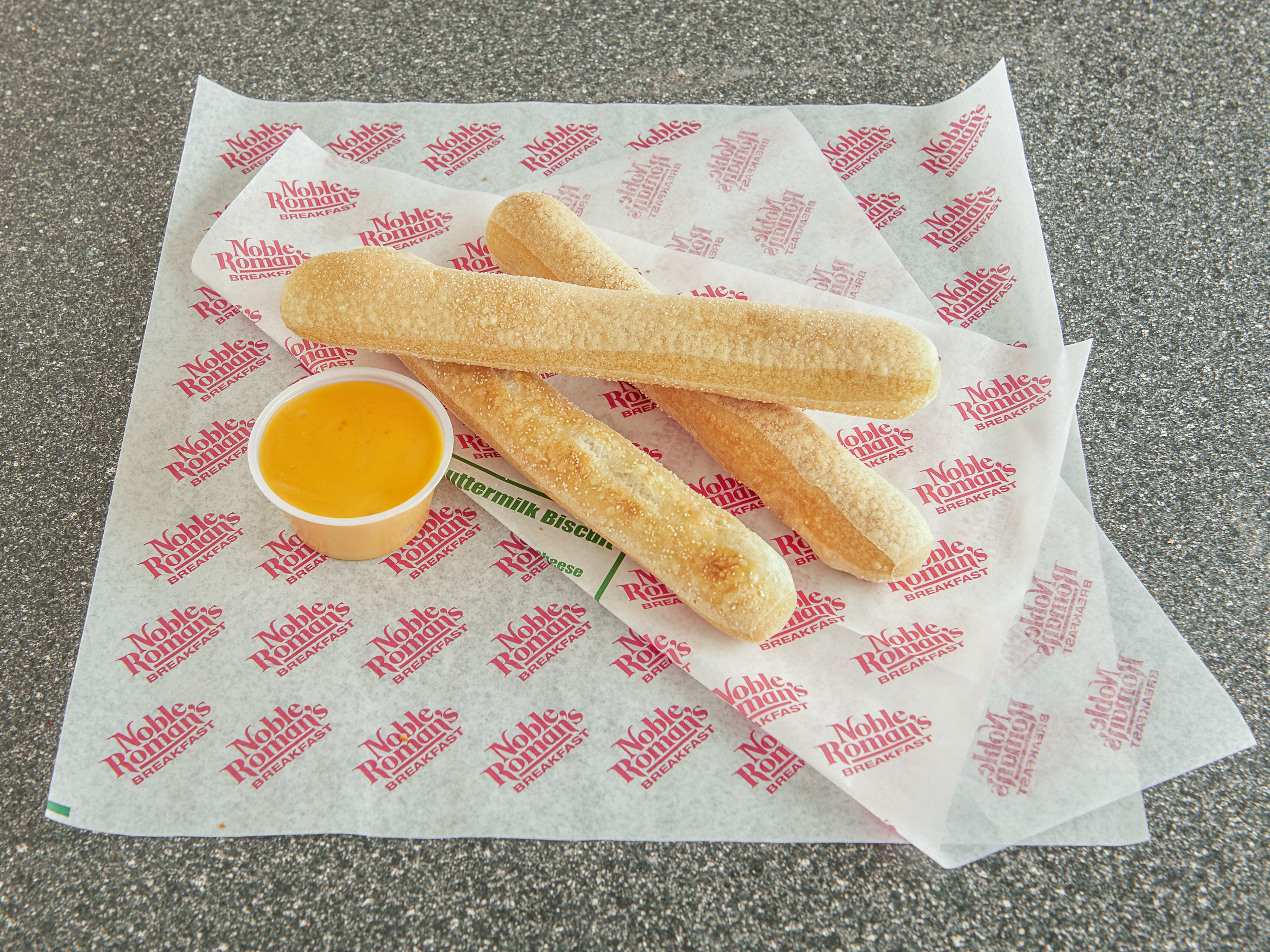 Order 3 Breadsticks and 1 Dip food online from Noble Romans store, Crawfordsville on bringmethat.com