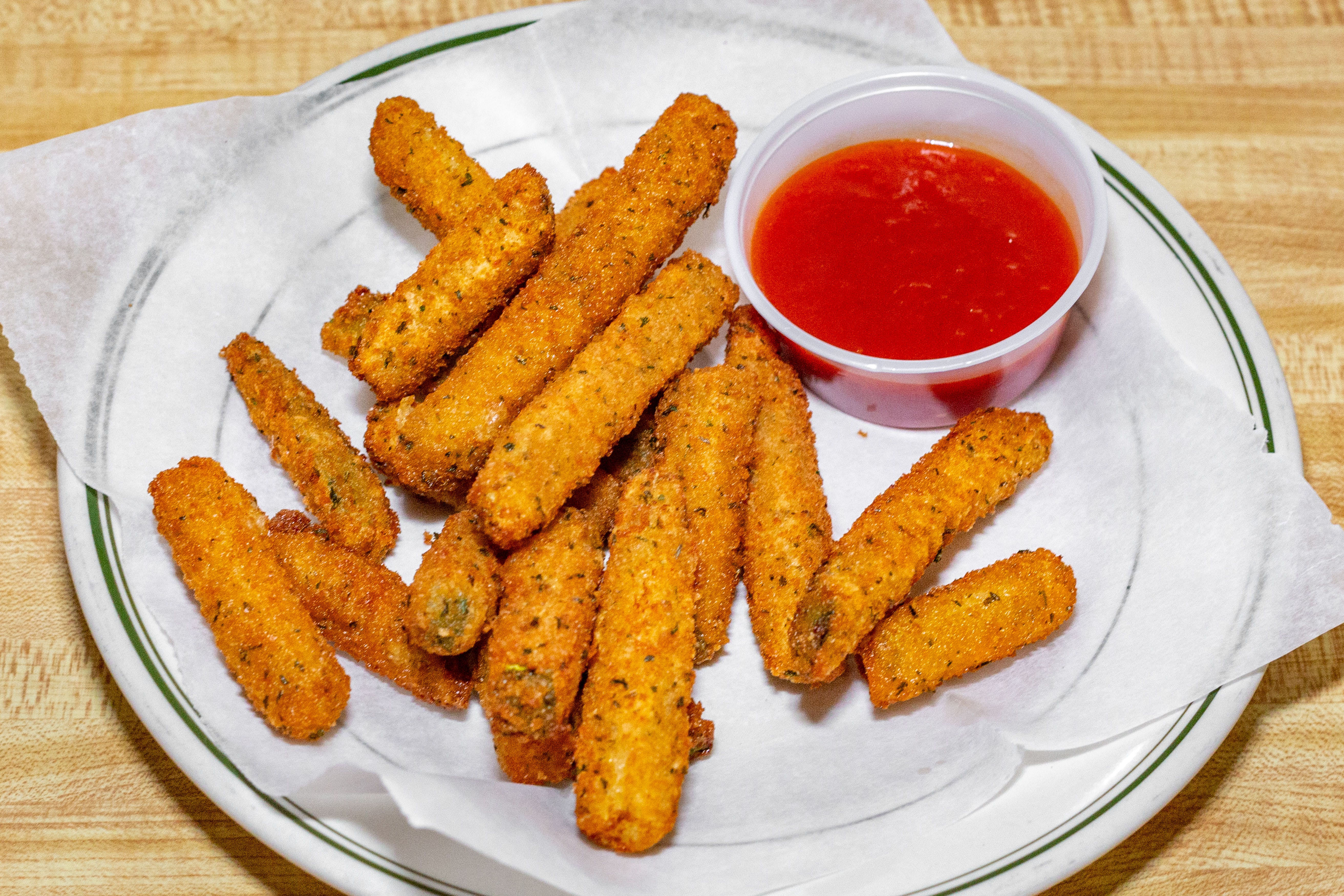 Order Breaded Zucchini - Appetizers food online from Capri Pizza store, Sicklerville on bringmethat.com
