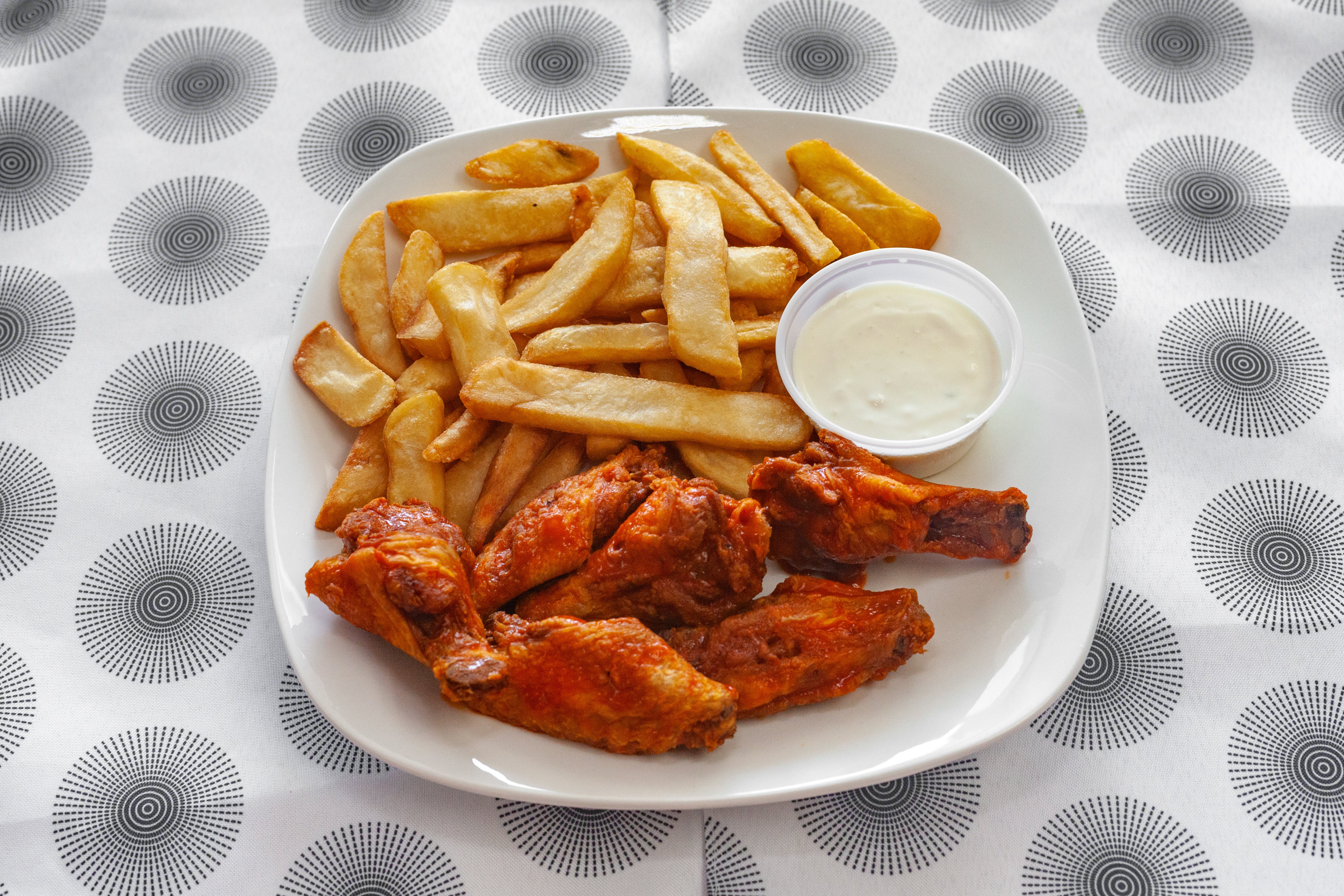 Order Hot Wings - 12 Pieces food online from Mr D Pizzeria Steaks & Subs store, Wildwood on bringmethat.com