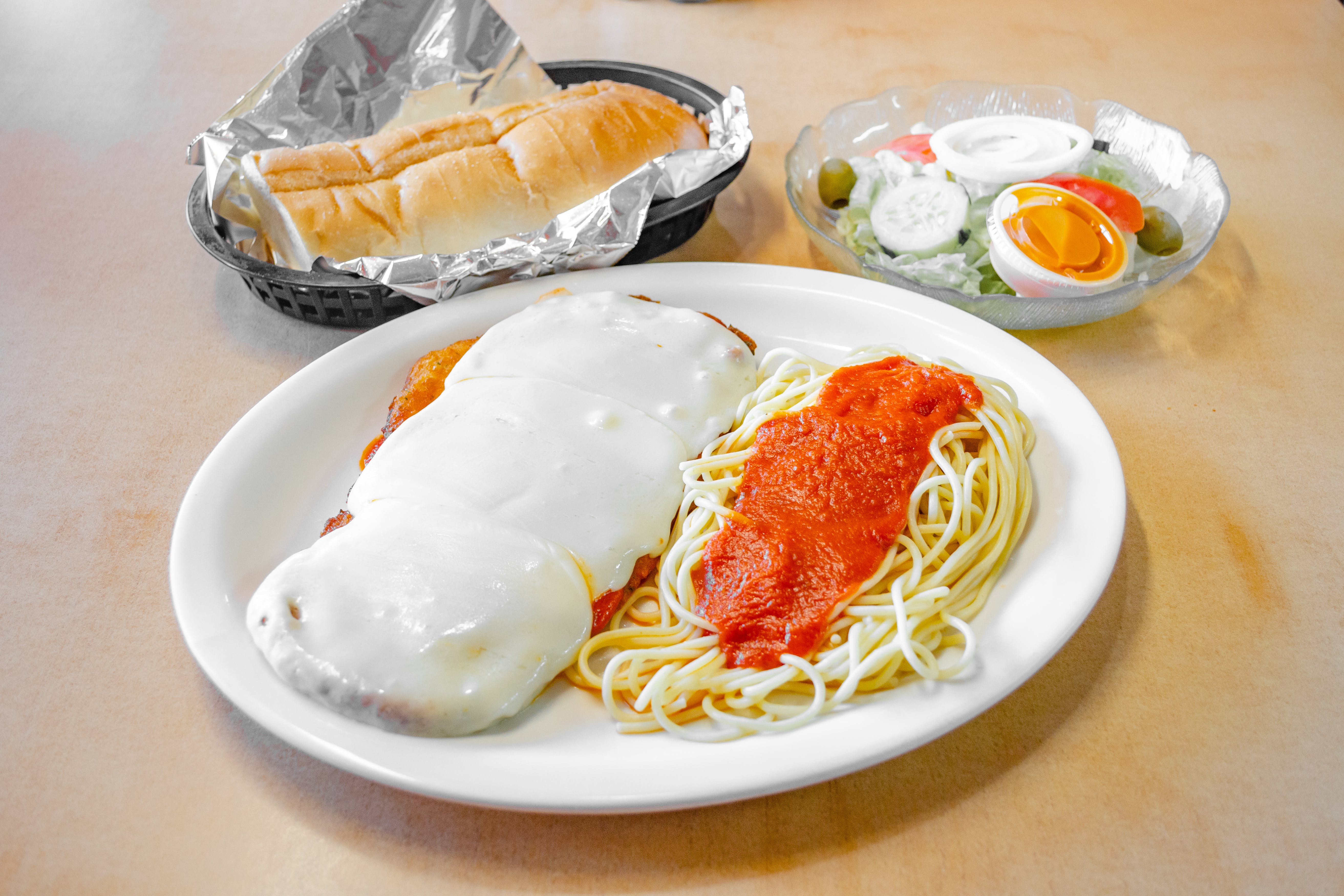 Order Chicken Parmigiana - Dinner food online from Ranchito Pizzeria & Mexican Restaurant store, Fords on bringmethat.com