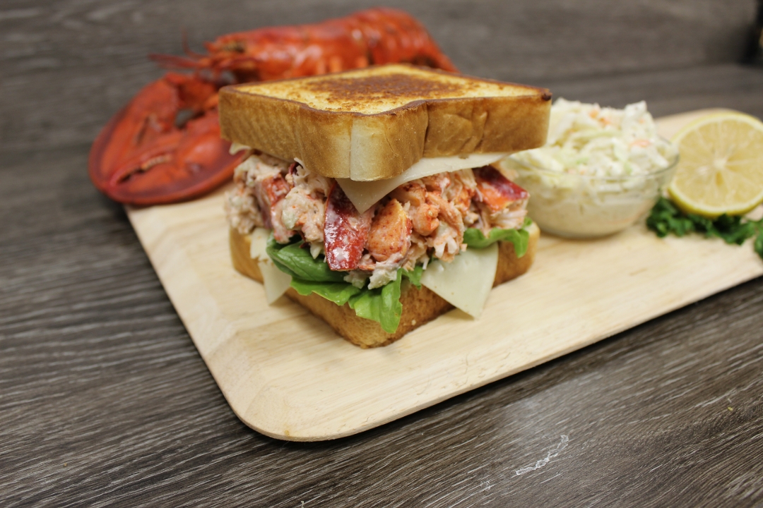 Order Hot Lobster Roll. Melt food online from Captain’s Curbside Seafood store, Trappe on bringmethat.com