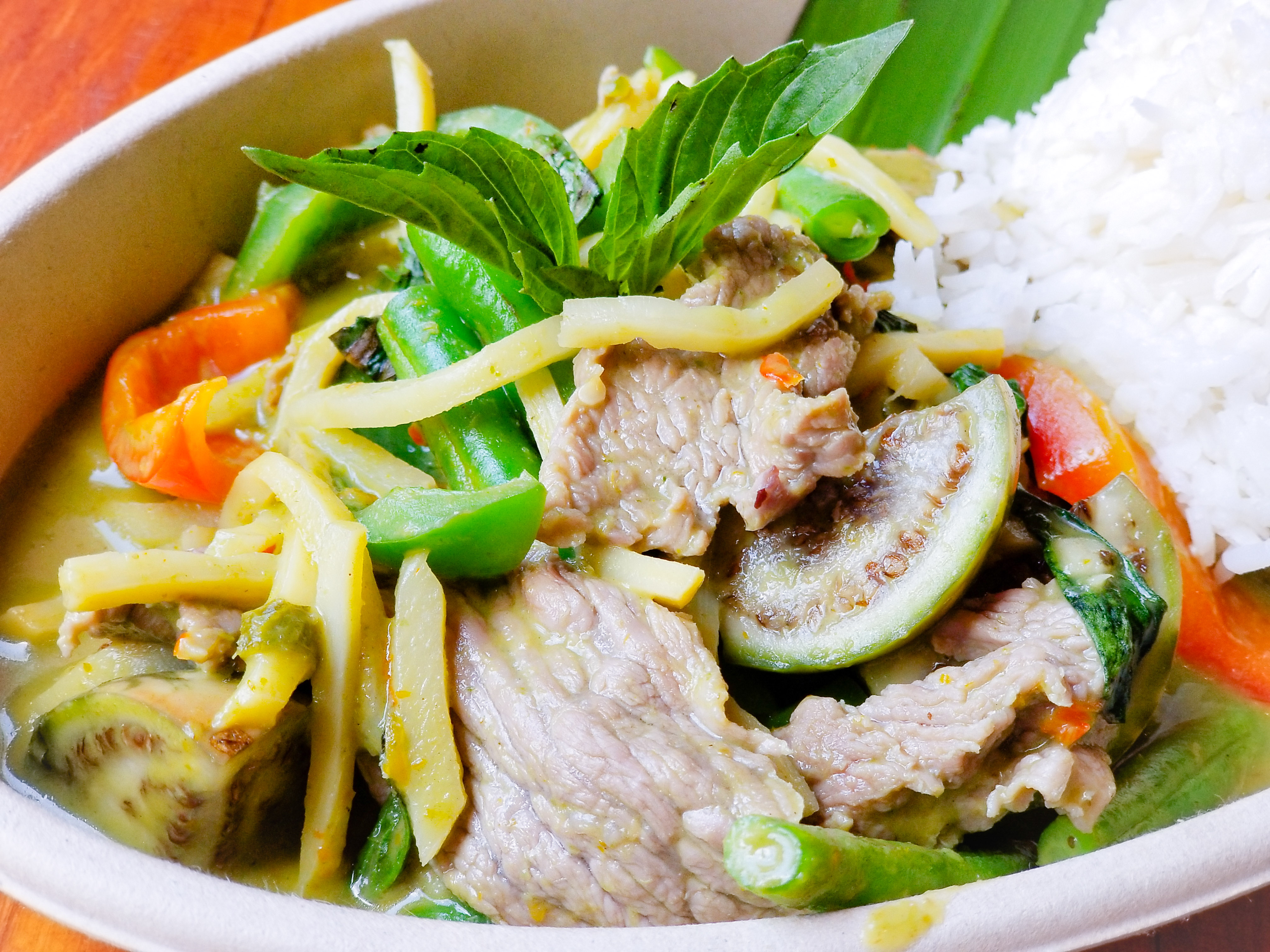 Order Green Curry food online from Tamsung Thai Street Eat store, Atlanta on bringmethat.com