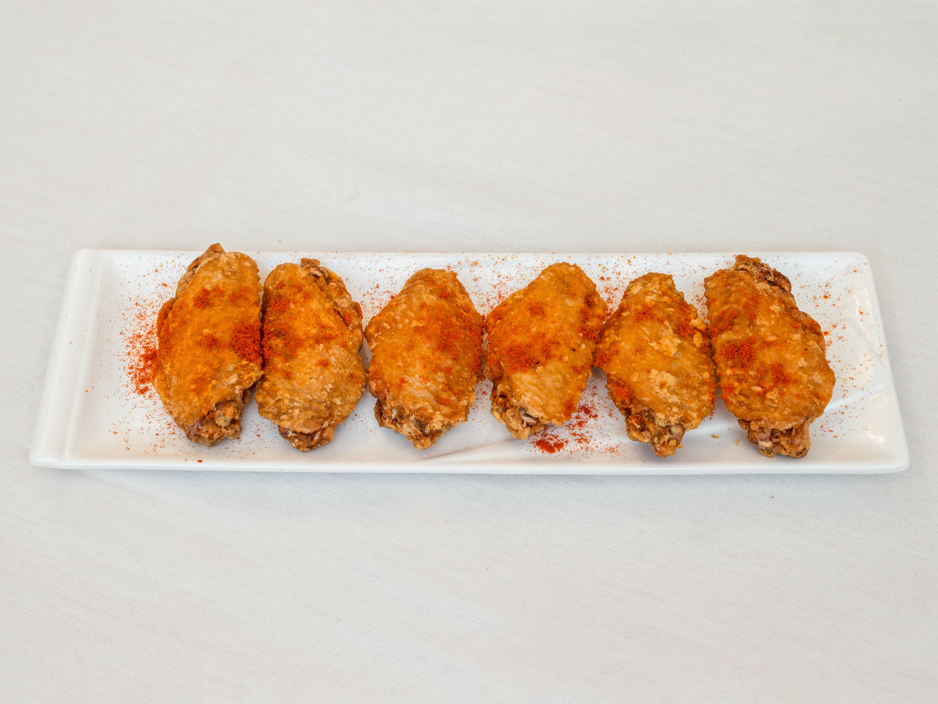 Order 29.FRIED CHICKEN WINGS (SPICY OR NON-SPICY) food online from Wu Liang Ye store, New York on bringmethat.com