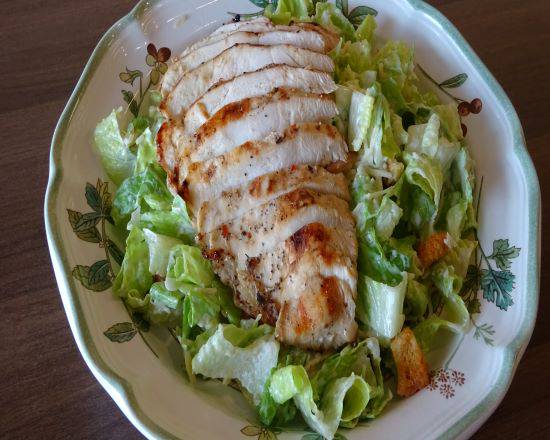 Order Caesar Salad food online from Emma Chicken Restaurant store, Alexandria on bringmethat.com