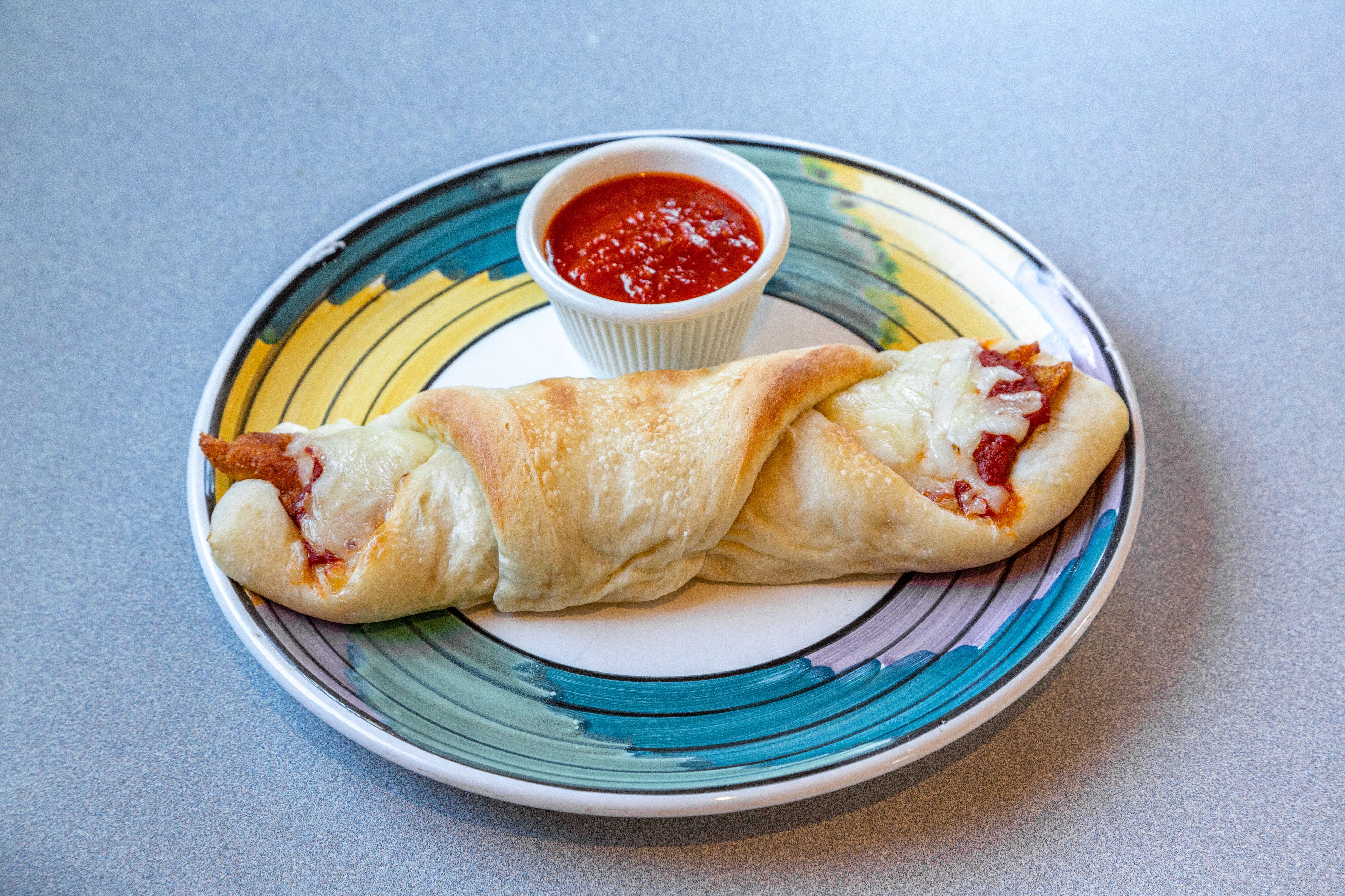 Order Chicken Roll - Roll food online from Pezzi Pizza store, Sea Cliff on bringmethat.com