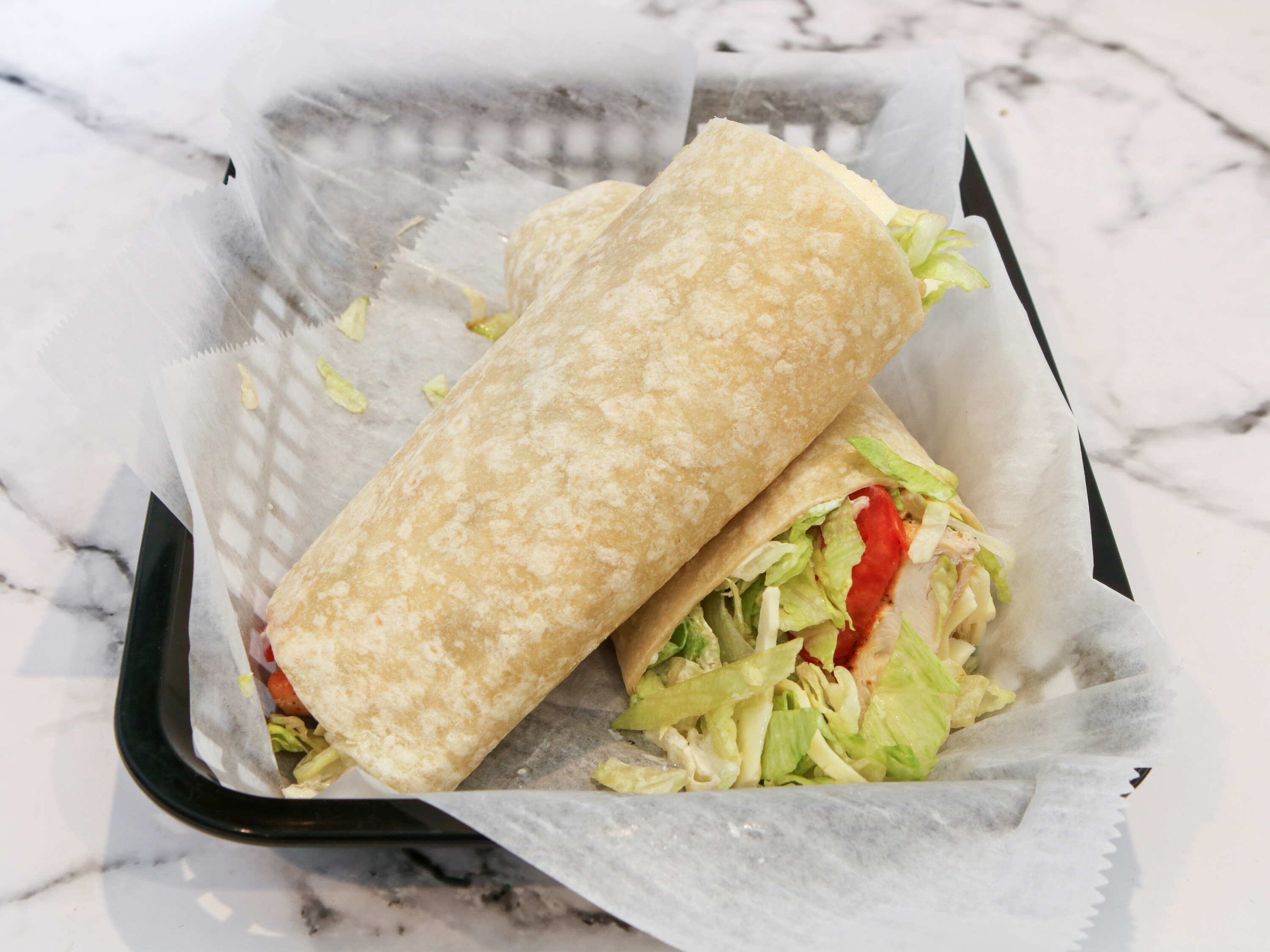Order Grilled Chicken Wrap food online from Yovanis Pizzeria store, Cumberland on bringmethat.com