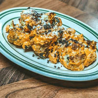 Order Mexican Cauliflower food online from Antique Bar & Bakery store, Hoboken on bringmethat.com