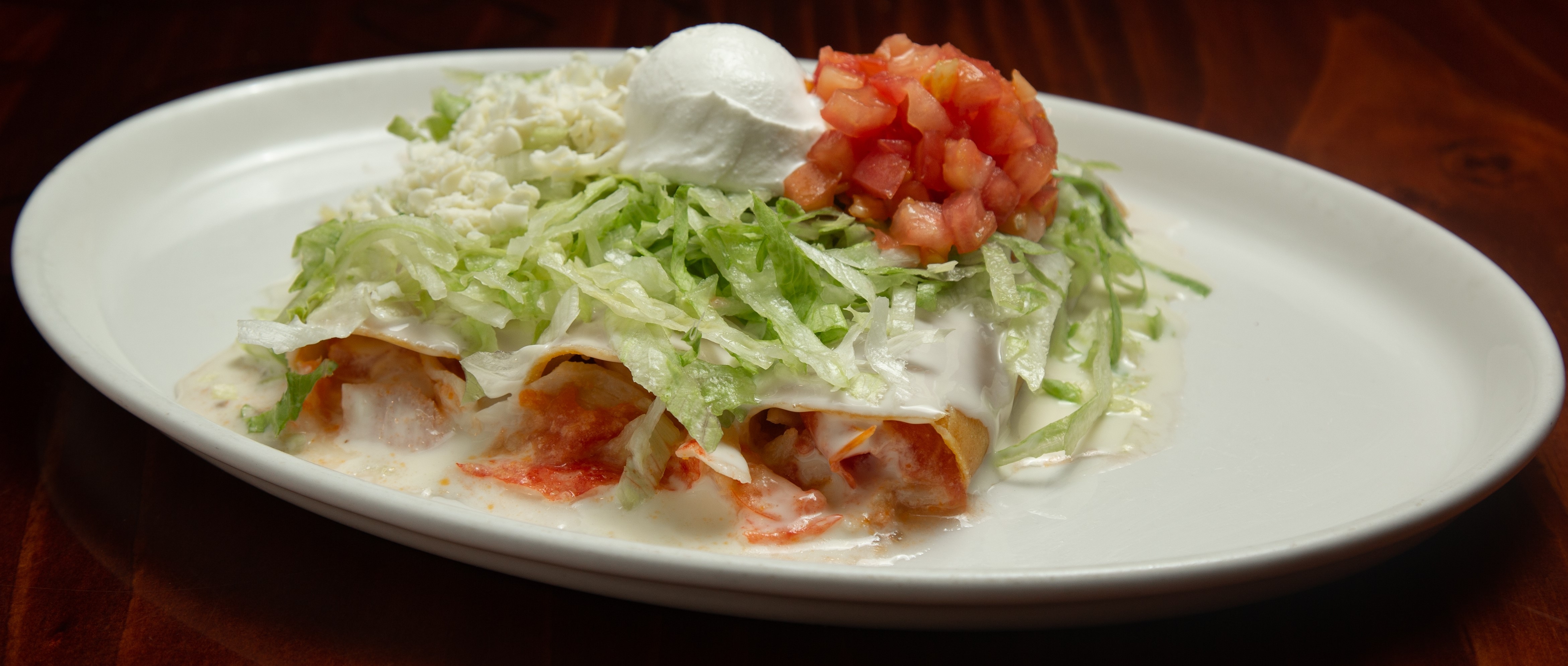 Order Seafood Enchiladas food online from Tito Mexican Restaurant store, Spring Hill on bringmethat.com