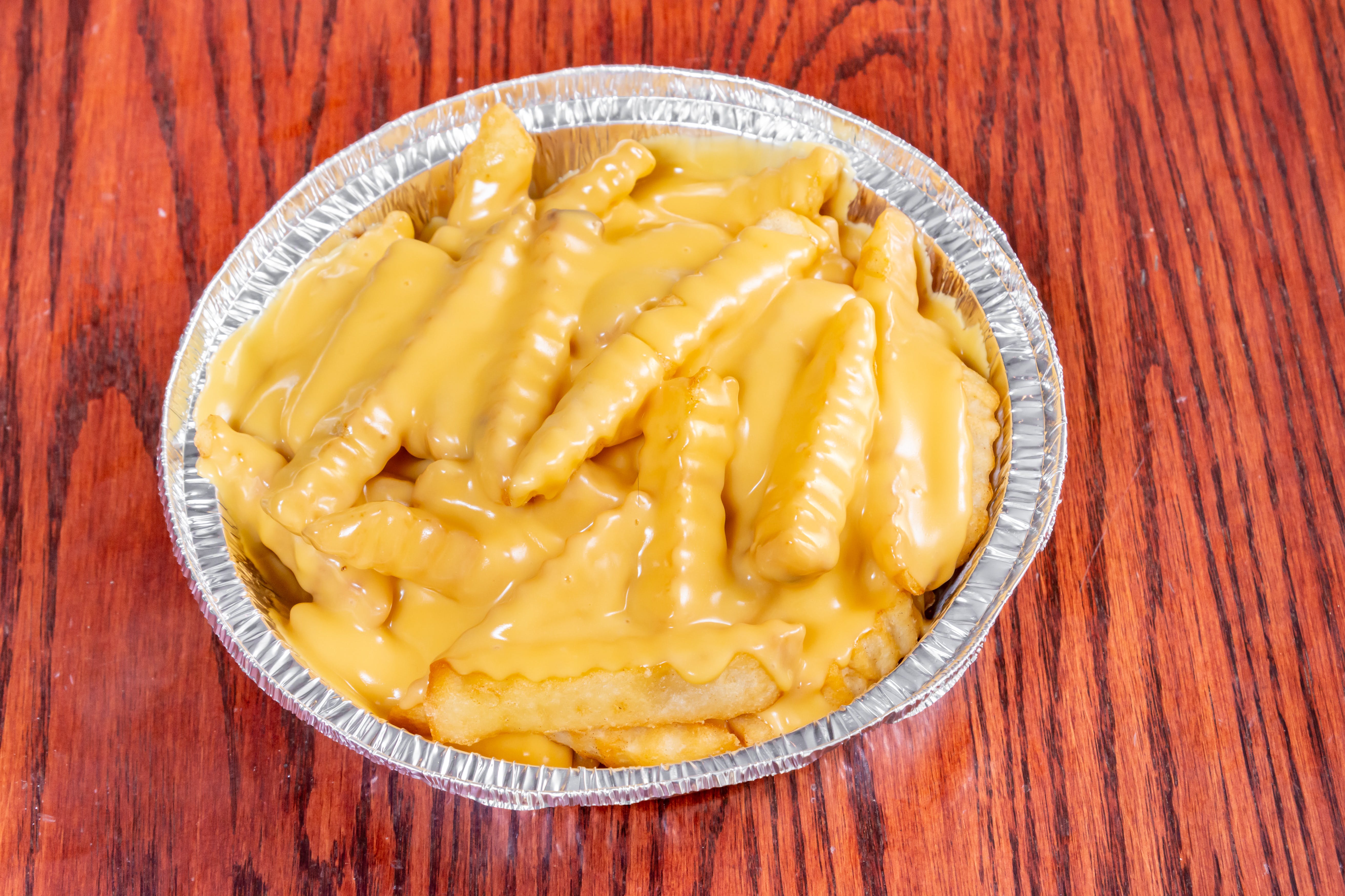 Order Cheese Fries - Appetizer food online from Rocco's Pizza Restaurant store, Kimberton on bringmethat.com