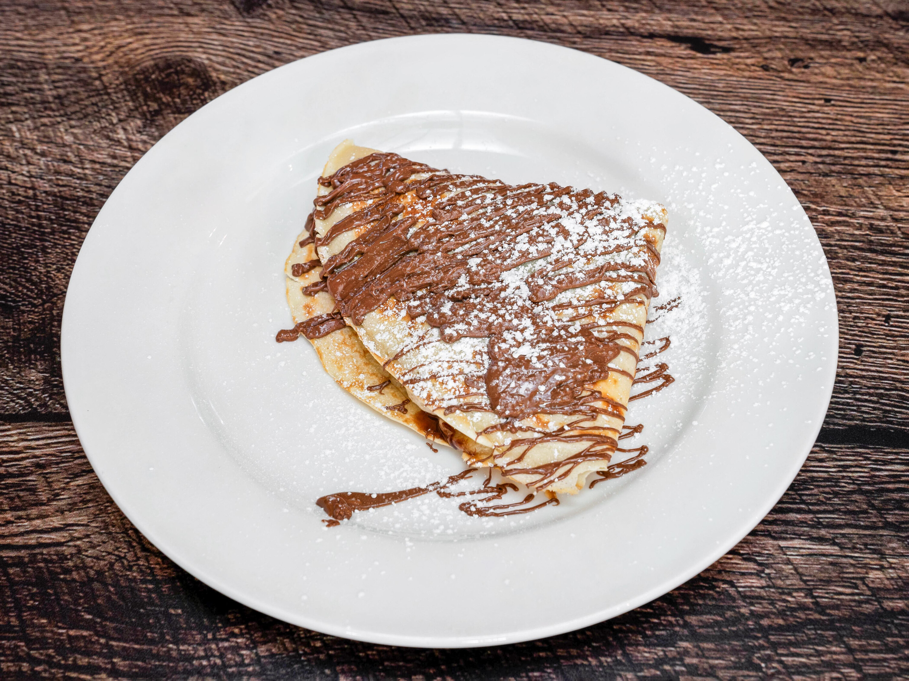 Order Banana Nutella Crepe food online from Crepes & Burgers store, Citrus Heights on bringmethat.com