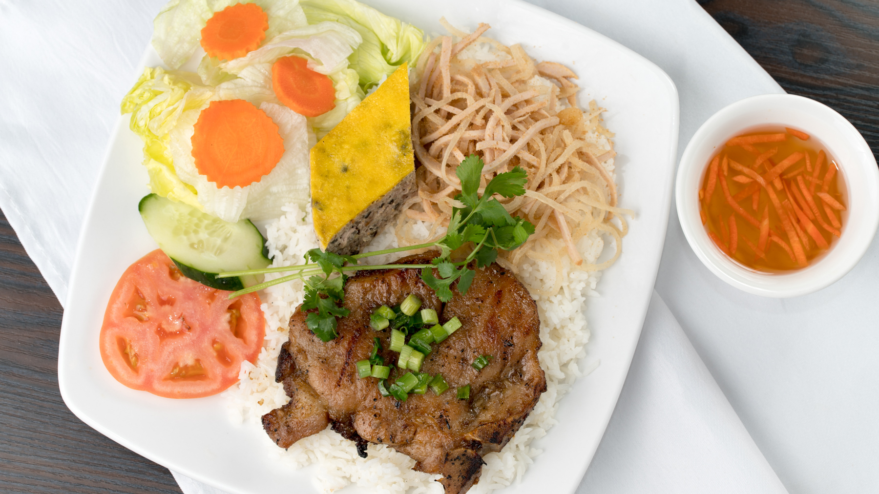 Order 40. Com Ga Nuong, Cha Gio food online from Pho Hoan Pasteur store, Garden Grove on bringmethat.com