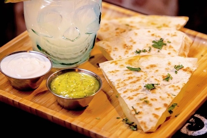 Order Quesadilla De Queso food online from Mad Dog And Beans store, New York on bringmethat.com